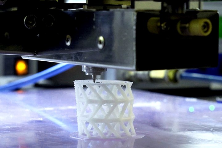 A 3D printer builds the scaffold from the composite material.