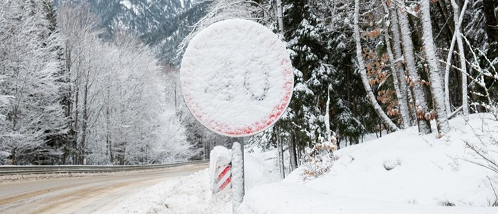 Snow-covered sign