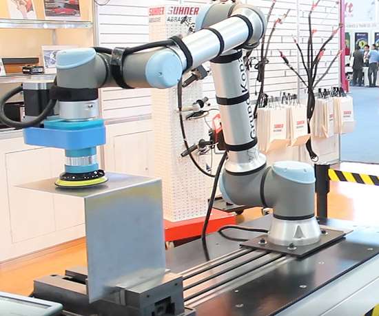 Línea de cabezales para aplicaciones de acabado superficial en robots.