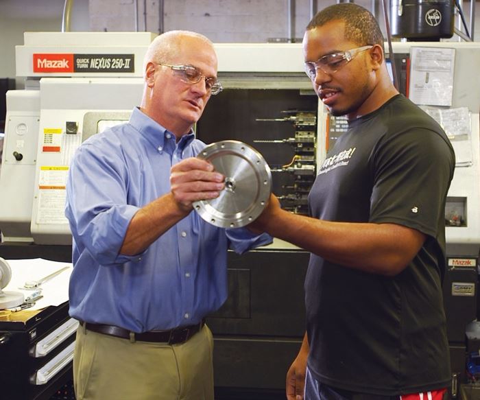 inspecting a part by a machine tool