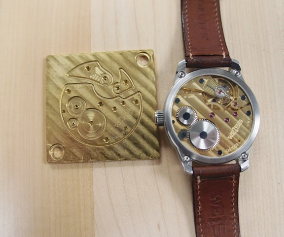 an in-process workpiece and a finished watch
