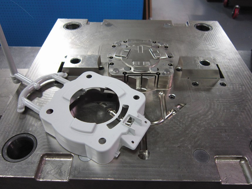 a plastic part with its machined mold