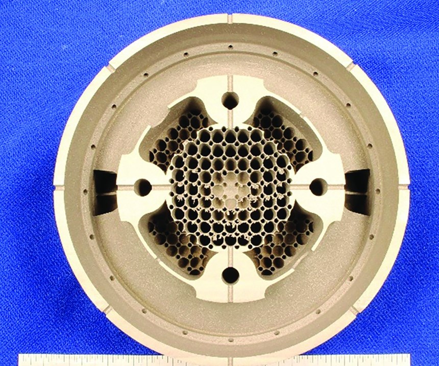 Additively manufactured piston crown