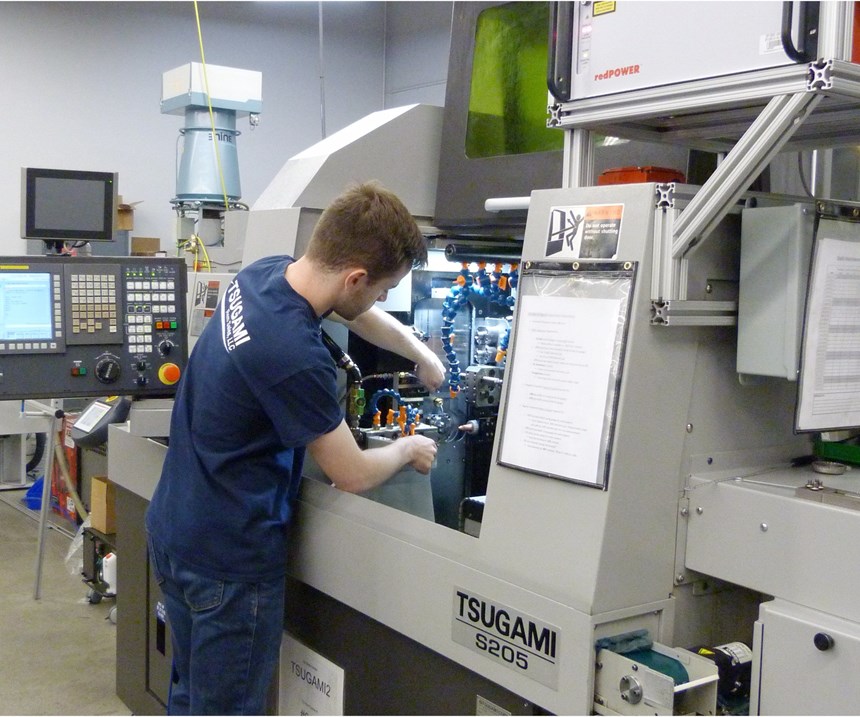 Eric Olander operates a LaserSwiss machine