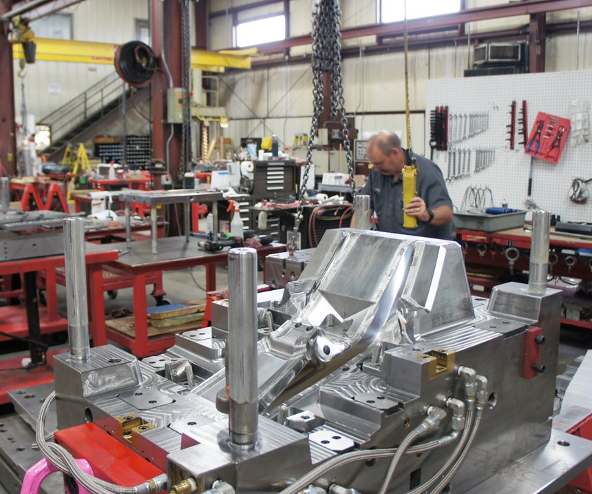 A complex plastic injection molds awaits further operations on the shop floor at Precise Tooling Solutions, which has a particular specialty automotive interior and lighting tools. 