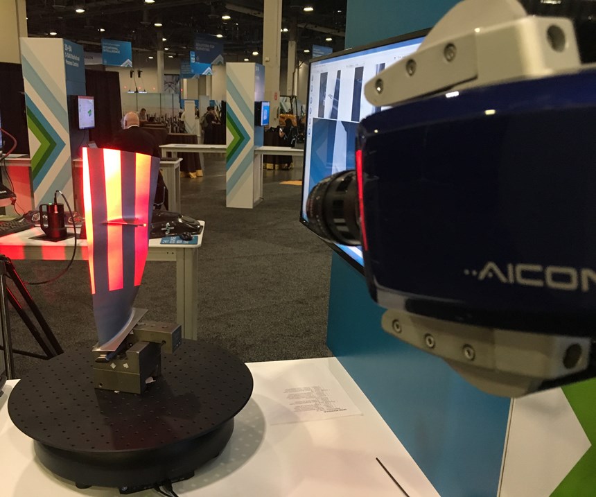 The Aicon Stereoscan Neo uses structured light light to digitize a curved part surface. 