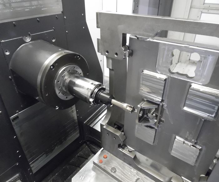 A view of the workzone of a horizontal machining center demonstrates the contrast between this configuration and that of a vertical machining center. 