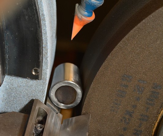 grinding a tapered roller