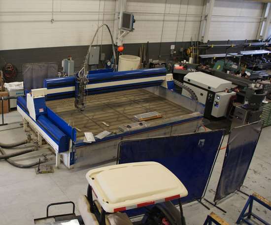 Viewed from above, the entire footprint of the waterjet and auxiliary systems appears especially large, but size is a chief advantage. 