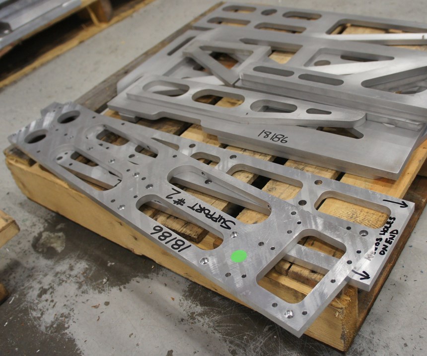 Examples of parts cut on IMC's waterjet. Some of these waterjet parts have also undergone  milling for 3D features like countersunk holes. The shop is experimenting with pneumatic drilling and reaming heads that could further expand the waterjet’s capabilities.