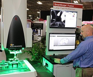QVI employee demonstrating on the Fusion 400 system