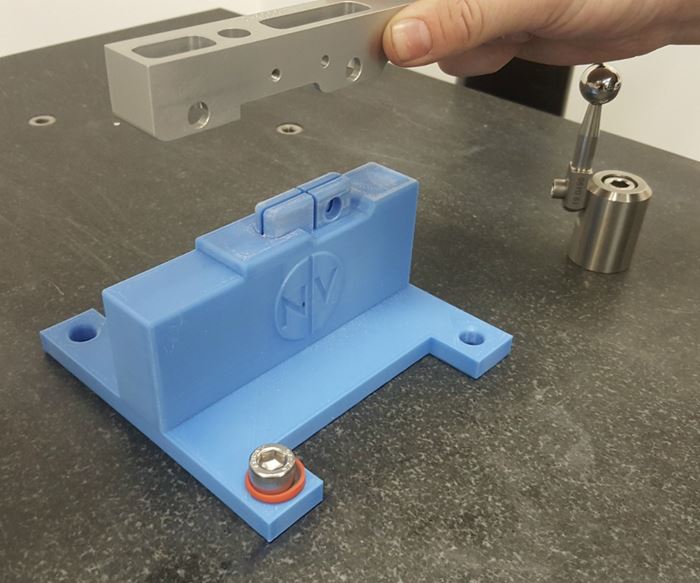 Bearing block held above the 3D-printed CMM fixture