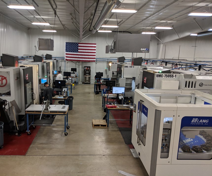 Cell of UMC-750SS five-axis machines, one with a Lang pallet changer