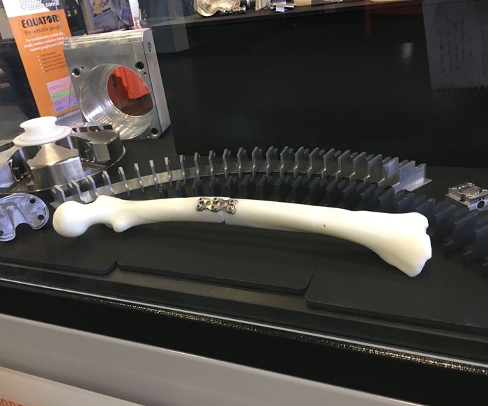 A plastic femur is on display at the Discover More With Mazak Northeast event May 14-16, which focused heavily on medical and aerospace machining. 