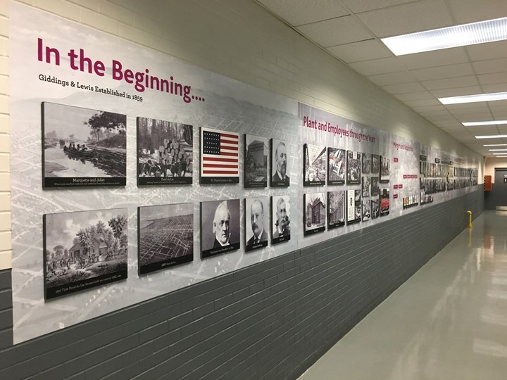 Wall-mounted plaques illustrate the storied history of the now 160-year-old Giddings & Lewis machine tool plant. 