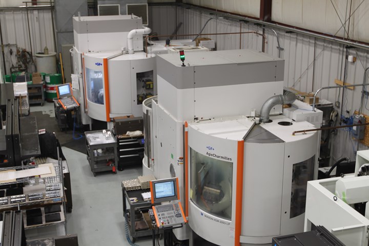 Five-axis machine tools on the shop floor at Advanced Precision Engineering (APE), a CNC machining business in Ipswich, Mass. 