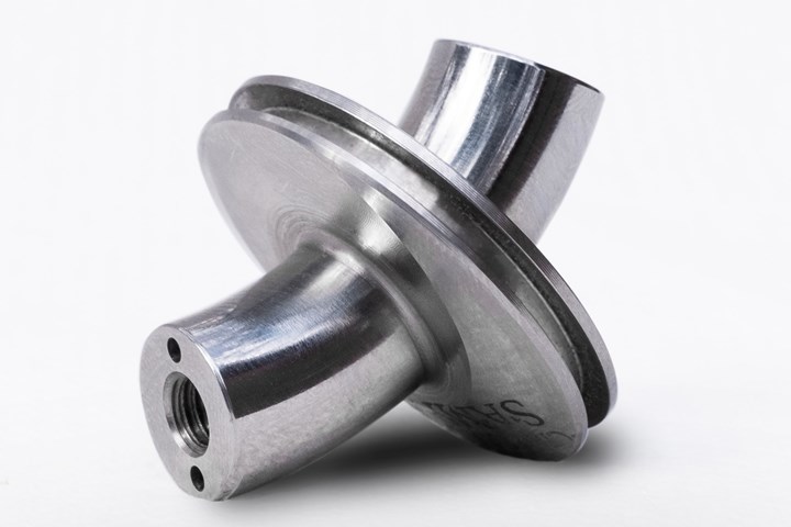 A piston for a foot prosthetic machined at Prosper-Tech Machine & Tool features sculpted, smooth-finish geometry. 