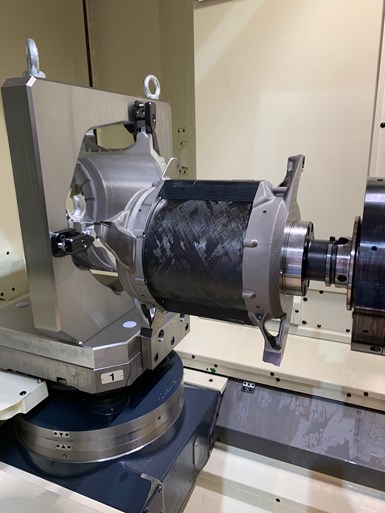 A large hybrid composite boring tool is mounted on a horizontal machining center on the floor of the EMO 2019 trade show. 