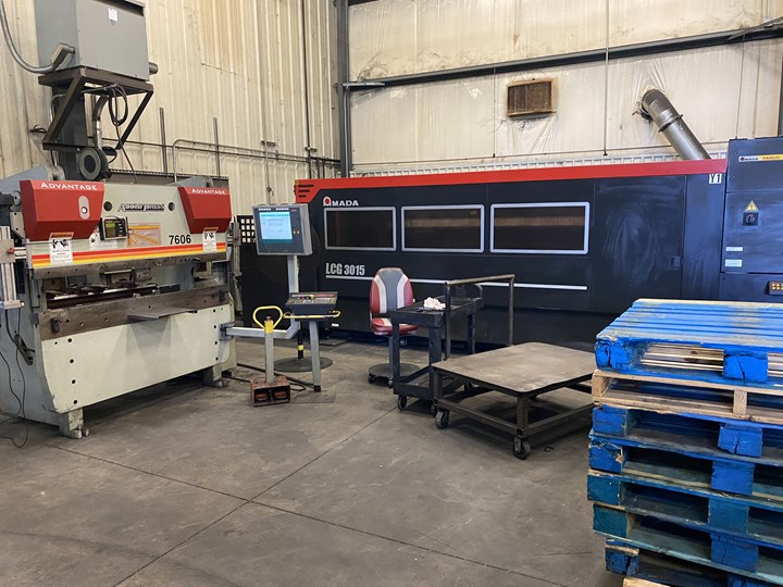 A press brake and laser cutter sit adjacent to one another on the shop floor at Cupples’ J&J. 