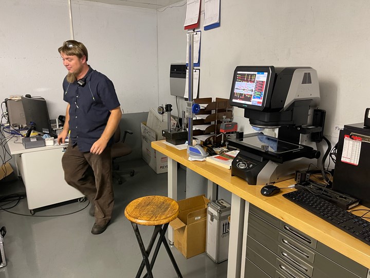 Steven Mullet, the son of Ken Mullet and now senior production manager at Northern Indiana Axle. Mullet outfitted a small inspection room after investing in Keyance IM Series optical comparators to inspect the high-precision gun parts the shop produces on its Swiss-type machines. 