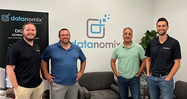Datanomix and Flexxbotics team members.