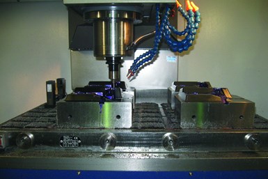 A photo of a workpiece resting on magnets