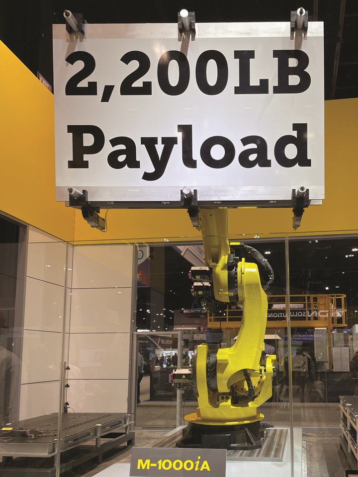 The FANUC M-1000iA robot, seen here handling a 1,000 kg EV battery pack in Booth 338919.