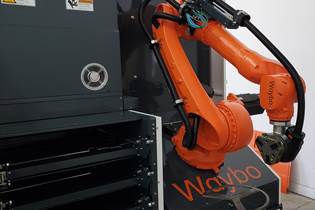 photo of Waybo-branded robotic arm on a machine