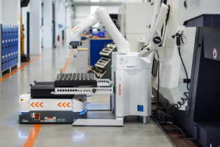 photo of a robotic part picker and delivery system