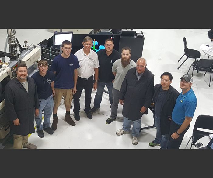 Group at RJG Inc. readies for injection mold tryout.