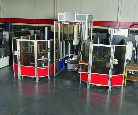 An automated hard milling cell featuring two vertical machining centers tied to a common coordinate measuring machine
