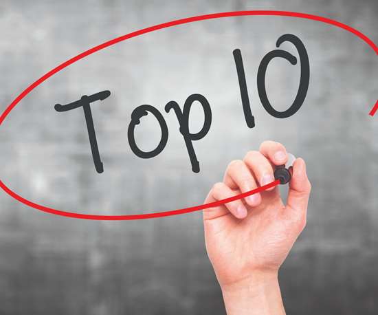 hand writing "Top 10" in black ink and circling it with red ink
