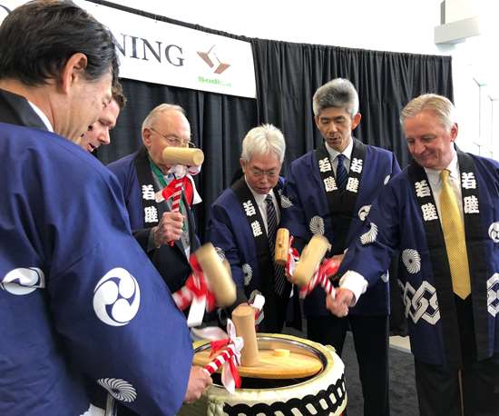 Traditional sake ceremony at Sodick USA Inc.