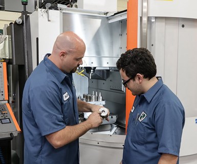 Westminster Tool apprentice learning about mold cavities.