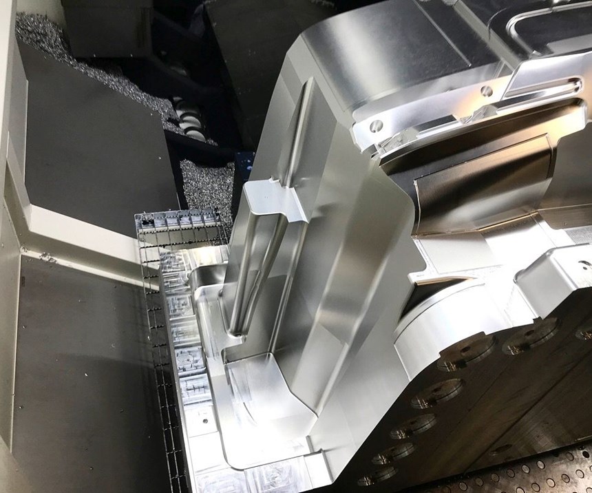 Injection mold half on CNC at Precision Mold & Machining Services Inc.