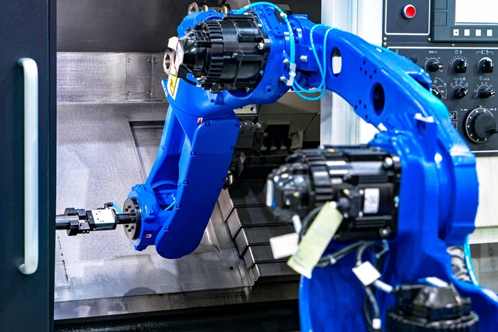 A robot arm in milling/drilling metalworking process.