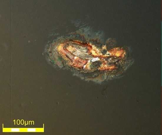 Rust defect under polarized light—693x, DSX510 microscope.