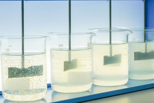 beakers with varied water quality samples