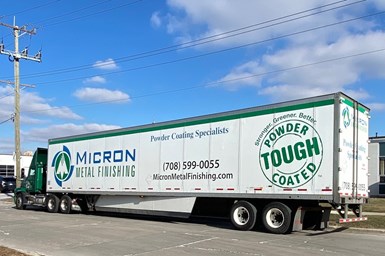 A semi with Micron's logo on it.