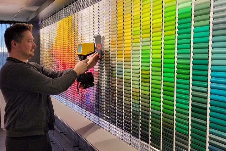 man scanning paint samples with coatmaster flex