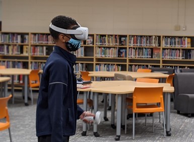 child using VR for STEM education