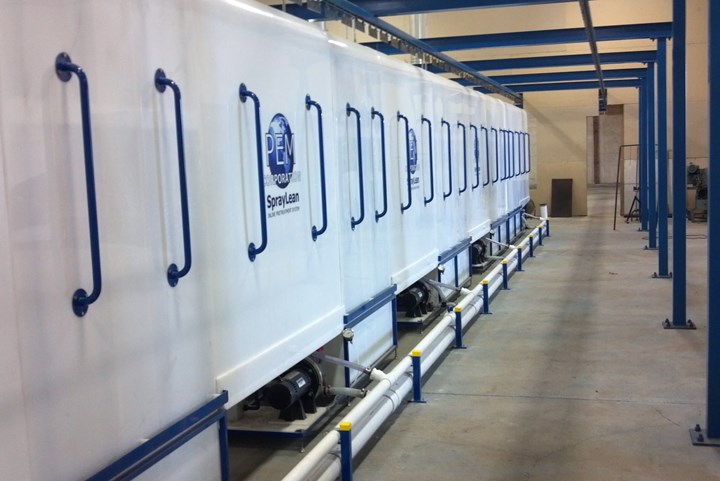 Photo of a white 6-bay parts cleaning tank with blue handles and logo