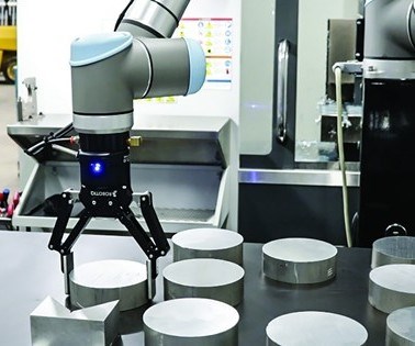 a robot picks up raw parts from a table