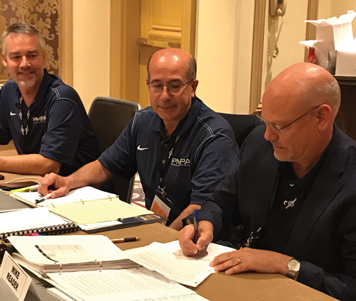 Mike Reader signs the PMPA/GMAS management agreement.