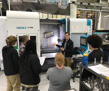 Kyle McCrocklin shows students an Index G220 turn-mill