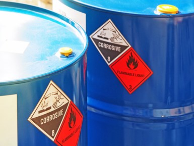 chemical barrels with warning labels