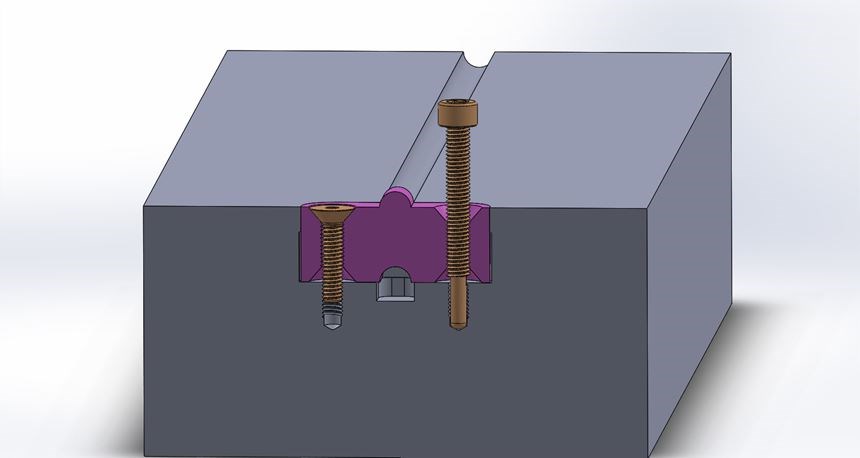 FIG 5. Un RSO de una pieza para una colada redonda. El tornillo de la derecha se usa para remover el RSO.