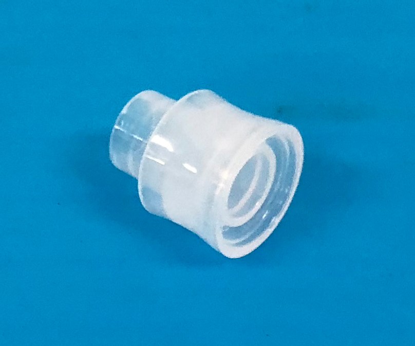 Micromolded sealing cap for precision cosmetics dispensing.