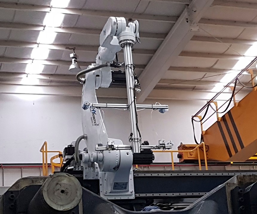 HYRobotics H5 robot on 2500-ton injection molding press.