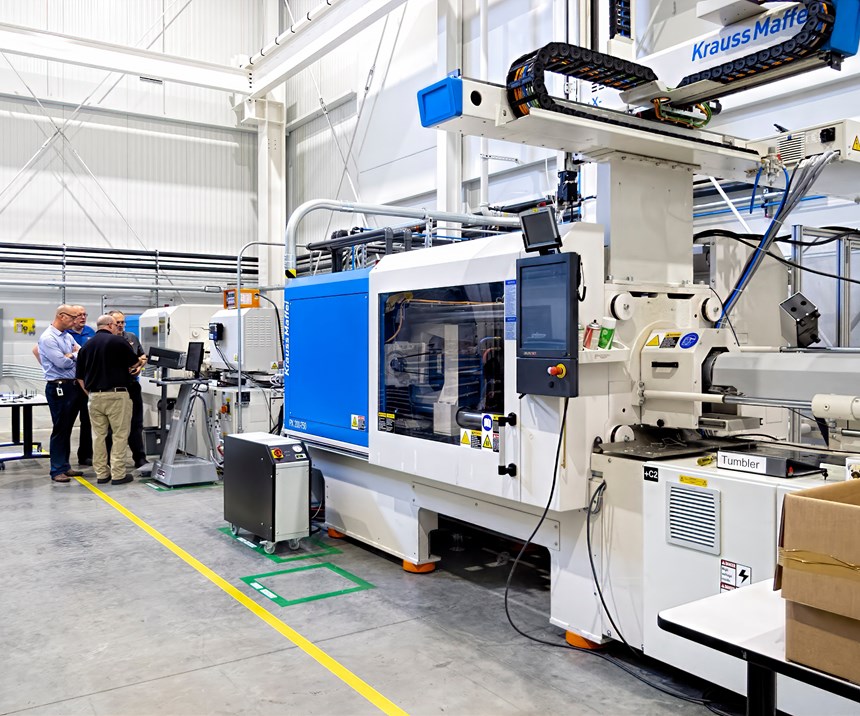 Besides manufacturing, the new building includes a training area with three KraussMaffei injection presses, two of them all-electric.